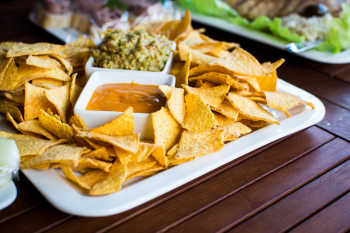 https://www.wesellrestaurants.com/public/uploads/images/_2022-07-19_16_31_foodiesfeed.com_tortilla-chips-with-salsa.jpg